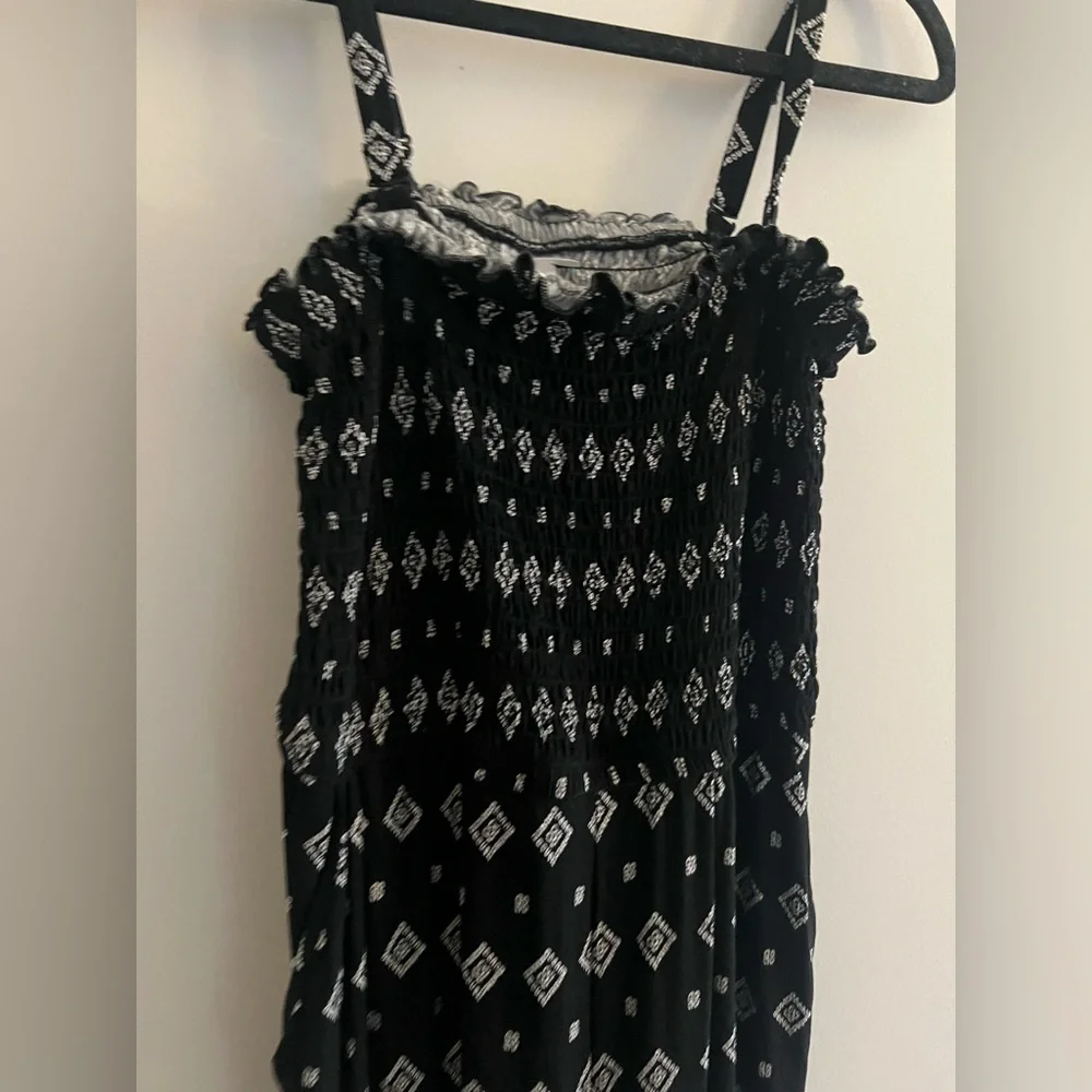Torrid Super Soft Black Border Print Smocked
Culotte Jumpsuit Size 0 - Picture 5 of 7